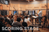 Ein Dirigent leitet ein Orchester in den Klangfabrik Studios , Text "SCORING STAGE" überlagert