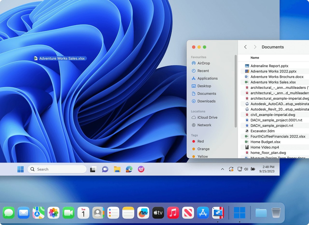 Windows 11 mit Explorer neben dem Finder von macOS, unten das Dock des Mac