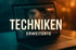 Laptop-Bildschirm zeigt Bildbearbeitungssoftware mit Text „TECHNIKEN ERWEITERTE“
