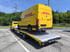 Aufgeladener DHL Sprinter auf einem Transportfahrzeug der Hess Fahrzeuglogistik.