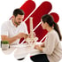 Medical clinic chiropractor explains spine model to patient
