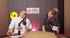 Two men, one bald with glasses, one with dark hair, sit at a table with microphones, "Ask the Surveyor" logo behind them.