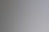Ein Mann bedient einen Rollsroller Flachbett-Applikator in einer Druckerei vor einem Schild mit der Aufschrift Willkommen.