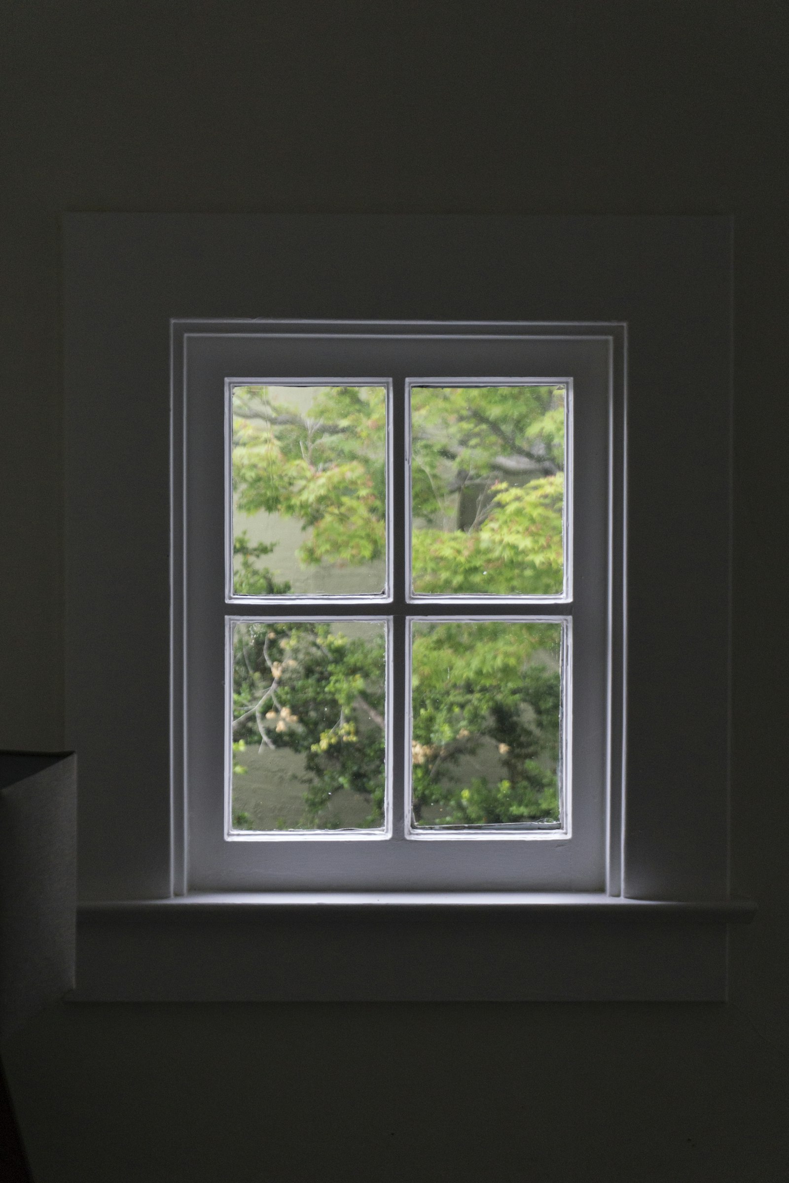 Replacement double-hung window with the sash raised
