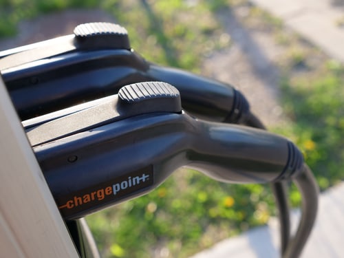 NACS and J1772 EV charging connectors close up for home Level 2 charging in Irvine, California