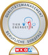 Goldene Auszeichnung für Qualitätsmanagement und berufliche Sorgfalt, mit dem Logo "TIER ENERGETIK" und "WKO Die persönlichen Dienstleister".