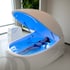 Person floats in a sensory deprivation pod, experiencing deep relaxation and dopamine therapy.