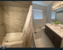 A beautiful Bathroom Remodel from Tile work to cabinet and sheetrock by Fairhope Fix