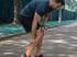 Man experiencing tendon pain in leg during outdoor activity and recovery