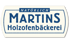 Logo: "NATÜRLICH MARTINS Holzofenbäckerei" in blauer Schrift auf weißem Grund mit blauem Rahmen.