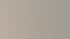 Mitarbeiterin am Empfangstresen einer modernen Zahnarztpraxis bei der Terminorganisation am Monitor.