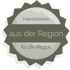 Graues, gezacktes Siegel mit Text: „Handwerker aus der Region für die Region“