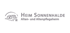 Logo vom Heim Sonnenhalde Alten- und Altenpflegeheim mit stilisierter Hausgrafik auf schwarzem Hintergrund.