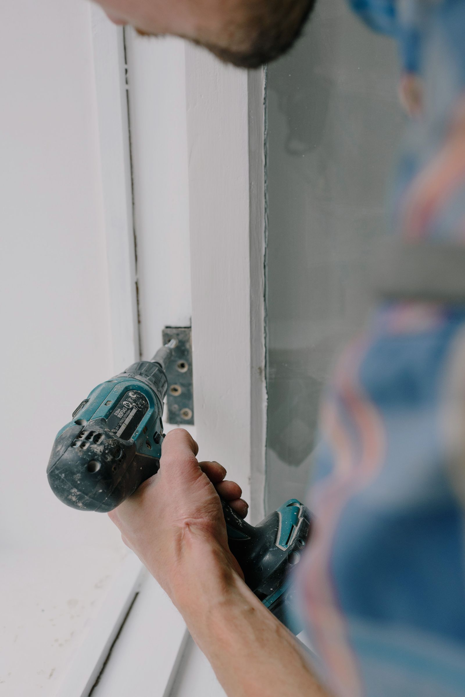 Energy-efficient replacement window installed in a bright room