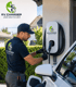 Licensed electrician installing a Level 2 EV charger in a Garden Grove garage