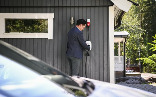 home EV charger charging an electric car and adding miles of range per hour in a San Clemente, CA garage