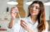 A female scientist or doctor preparing a syringe.