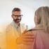 Doctor comforting an elderly female patient in SouthLake, TX.