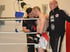 Daniel Solzer, Gründer der update Unternehmerberatung und Vollkontakt-Unternehmercoach im Boxring bei einem Kickboxkampf.