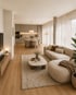 Modernes Wohnzimmer in Beigetönen mit hellem Sofa, flauschigem Teppich, Marmortisch und offenem Essbereich im Hintergrund.