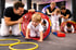 Minis trainieren gemeinsam in einer kleinen Gruppe bei First Martial Arts Bayern.