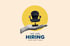 Bürostuhl auf einer Handfläche vor gelbem Kreis; Text: "WE ARE HIRING JOIN OUR TEAM".