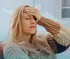 Woman with a headache or migraine.