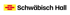 Logo von Schwäbisch Hall mit stilisierten roten Ziegeln auf gelbem Hintergrund.