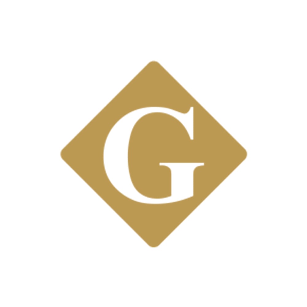 Eine goldene Raute mit einem weißen G Buchstaben mittig.