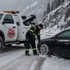 Towing Deltona snow recovery service helping a stranded car stuck in deep snow with professional roadside assistance