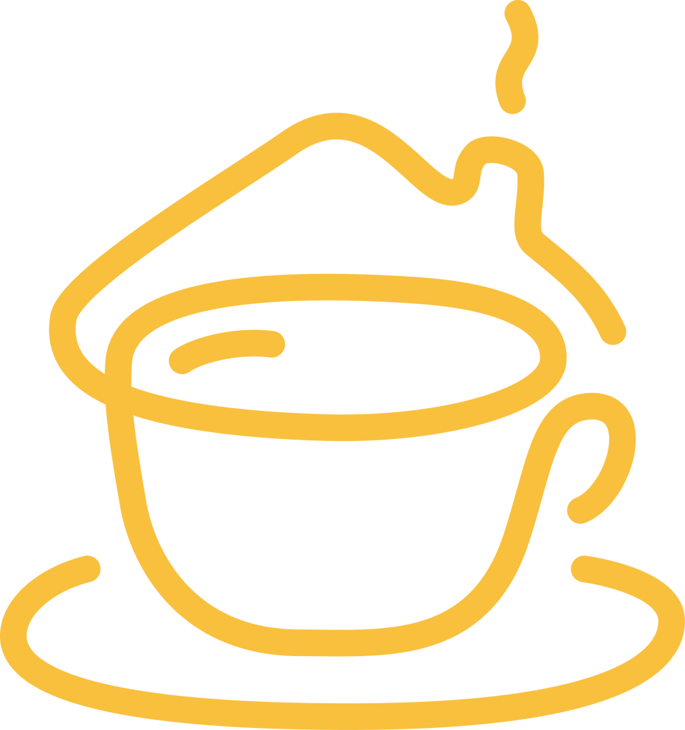 Gelbe Tasse mit dampfendem Heißgetränk auf einer Untertasse.