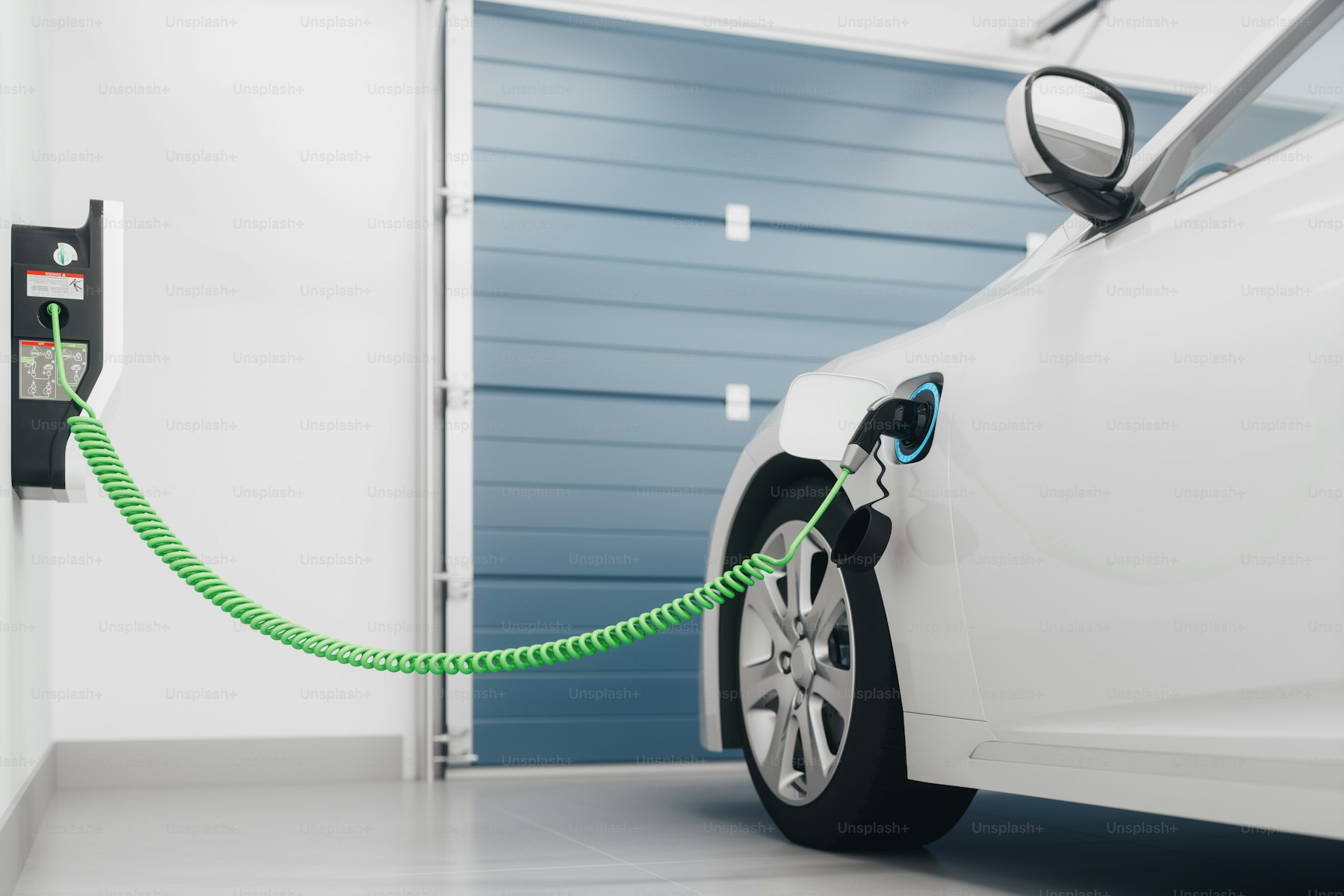 Electric vehicle charging from a wall-mounted charger in a residential garage