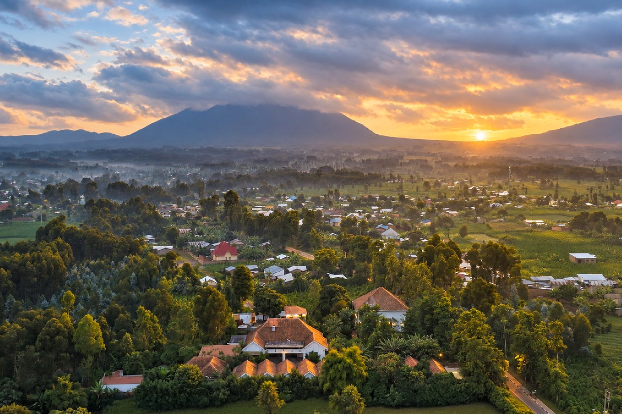 The hotel beneath the Virunga volcanoes at sunset