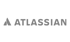 Atlassian-Logo in Schwarz auf dunkelgrünem Hintergrund.