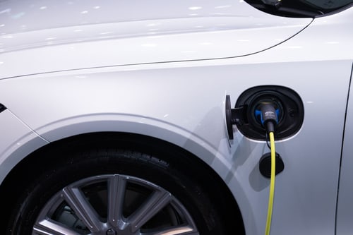 EV charger maintenance in Fullerton - charging connector plugged into an electric car