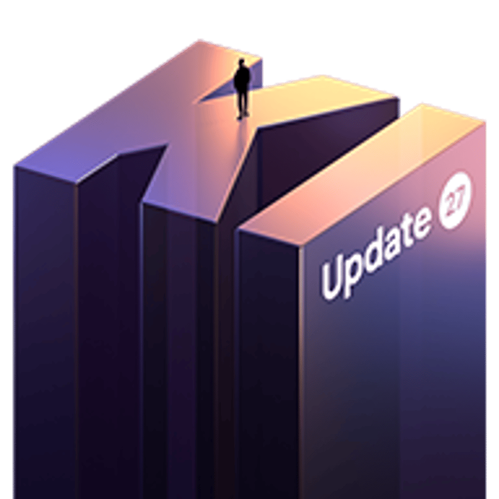 Eine Person steht auf einem großen 3D-Buchstaben „KI“ mit dem Text „Update 26“.