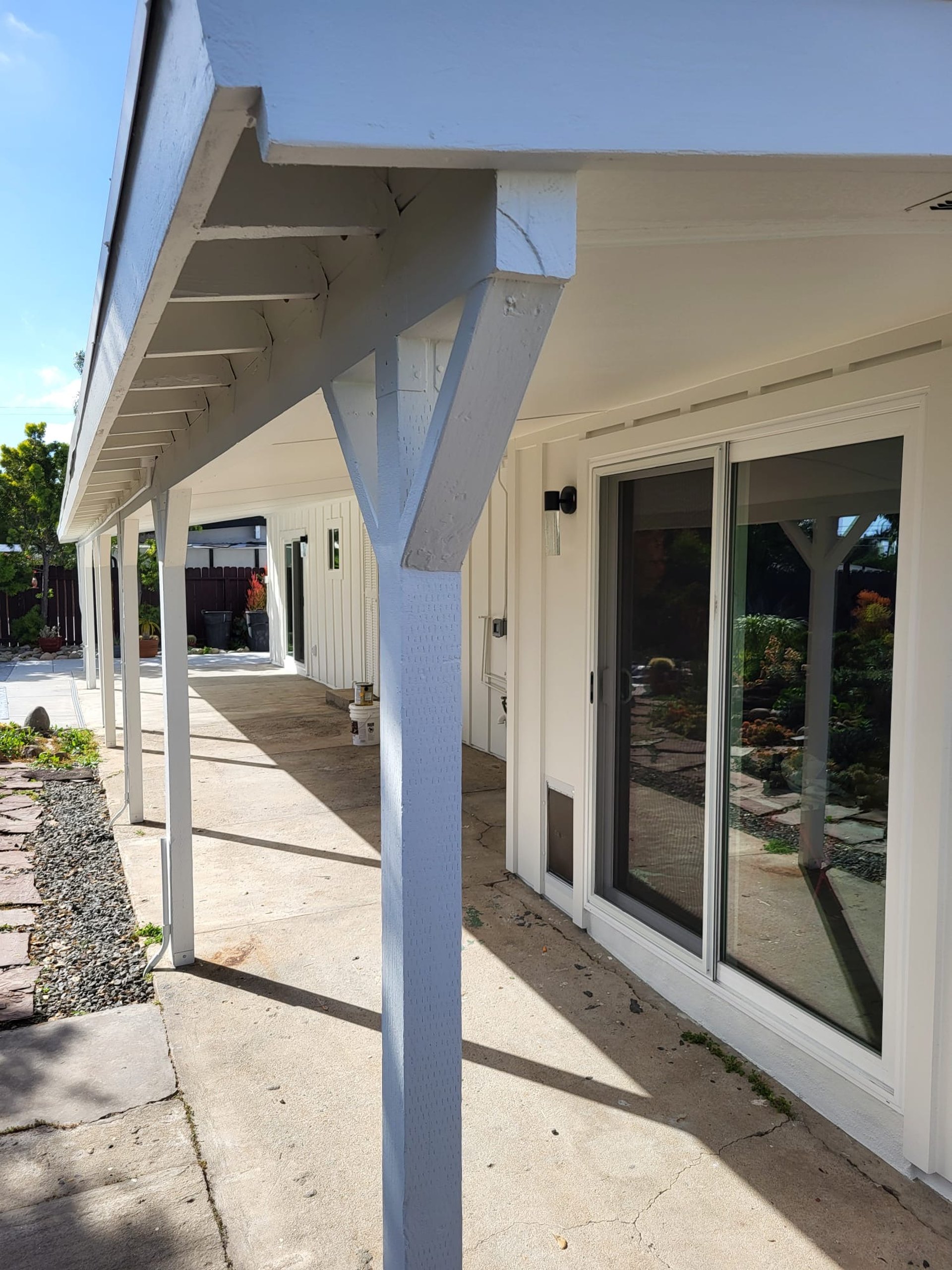 Vertical James Hardie board and batten siding installed by Approved Contractor