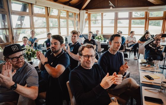 Guests applauding at the award ceremony