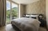 Elegant möblierte Schlafzimmer mit Bergblick im WaltherPark.