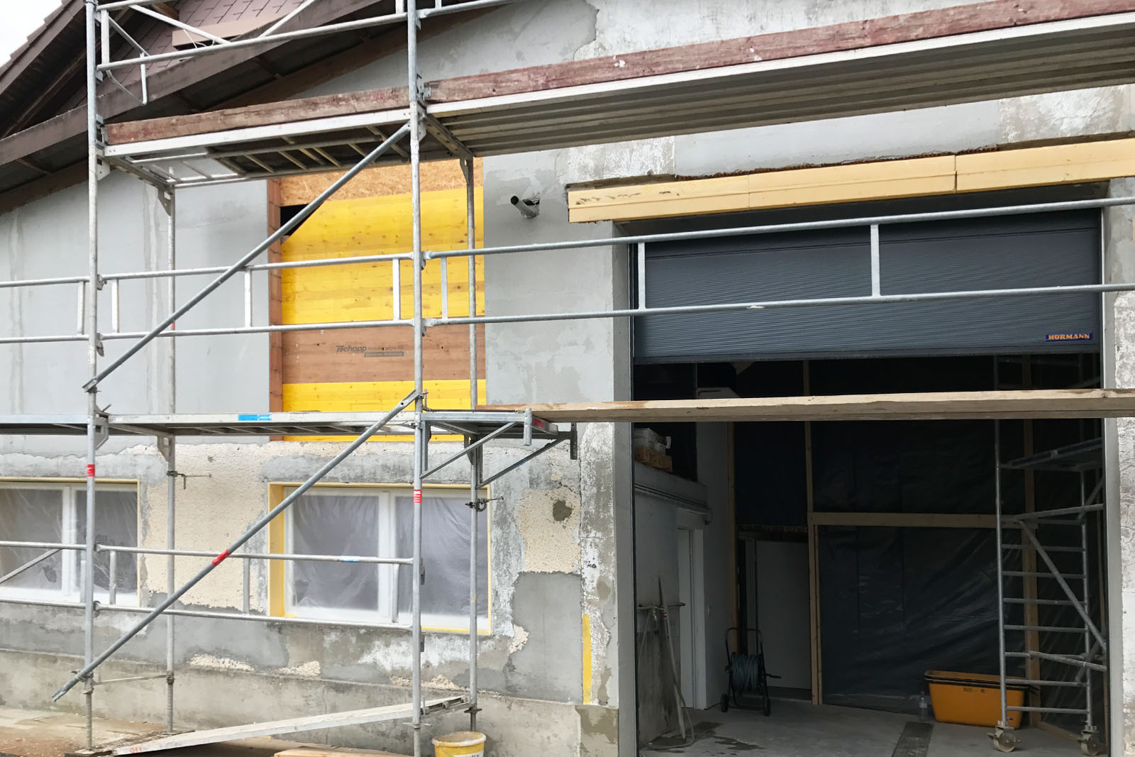 Toreinbau und Mauer- und Fassadenarbeiten