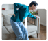Woman clutching lower back in pain from a herniated disc