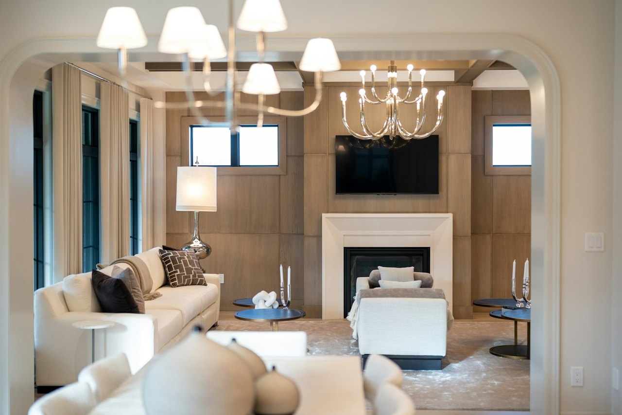 A homeowner using a tablet to control smart home settings