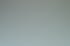 Ein gedeckter Tisch mit Spiegelkugeln, blauen Cocktails, Ananas, Orchideen und Zitrusfrüchten.