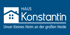 Logo "HAUS Konstantin" mit weißem Haus-Symbol und Text "Unser kleines Heim an der großen Heide" auf blauem Hintergrund.