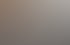 Modernes Café mit Holzwänden, schwarzen Tischen und einem großen Brezel-Logo an der Wand.
