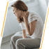 Woman grips her neck, enduring chronic pain and fibromyalgia.
