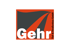 Von der Firma Gehr Tief- & Straßenbau GmbH: Logo mit stilisierter Straße auf orangem Hintergrund