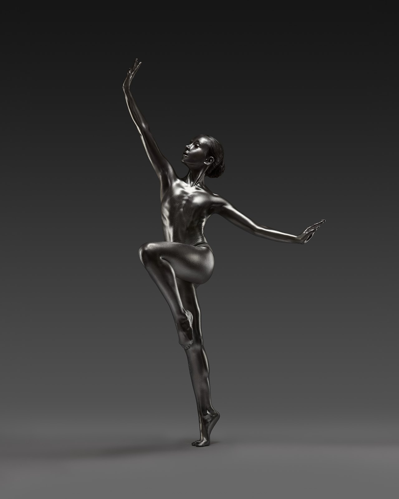 A dancer with silver body paint stands en pointe in a sculptural pose.