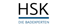 HSK Die Badexperten Logo mit schwarzem "HSK" und blauem Text "DIE BADEXPERTEN" unter einer blauen Linie.