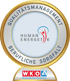 Goldenes Abzeichen für Qualitätsmanagement und berufliche Sorgfalt, mit "Human Energetik" Logo und WKO Siegel.